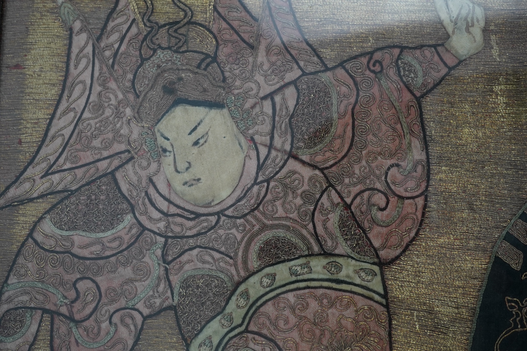 A Chinese embroidered silk ‘Peking Opera’ panel, early 20th century